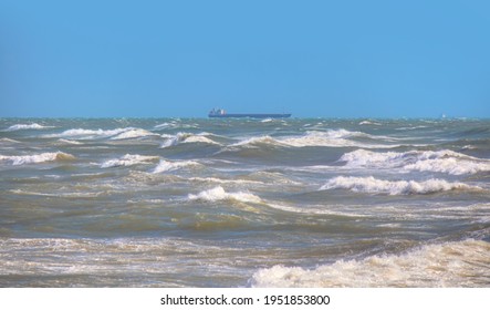 Rough Sea With Container Ship In The Background