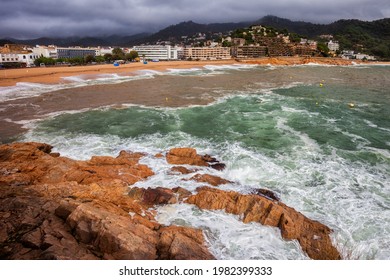 Rough sea on windy day in Tossa de Mar resort town on Costa Brava in Spain.