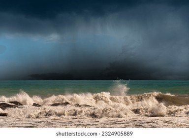 Rough sea with storm clouds (cumulonimbus) and torrential rain. Mediterranean sea (Ligurian sea), Gulf of La Spezia, Liguria, Italy, Europe.