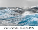 Rough seas. Waves and spray.