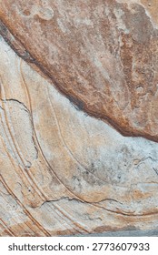 Rough stone texture with erosion marks and organic shapes abstract background