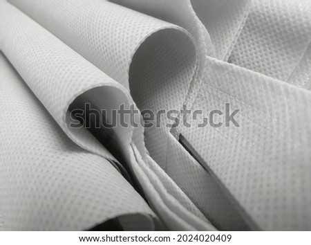 rough texture of white polypropylene fabric