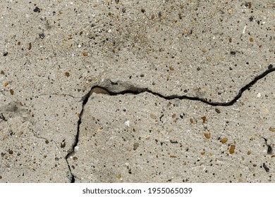 Rough Textured Surface Of A Cracked Concrete Foundation Slab.