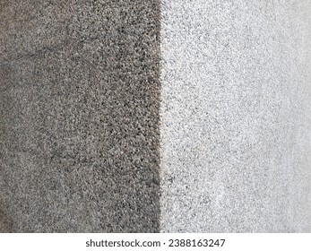 Rough textured surface with exposed aggregate finish, floor stone washed wall, made of small sandstone mix, grooved line decoration. Can be used as background or texture