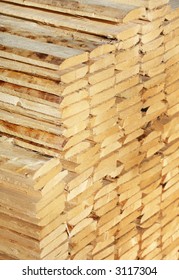 Rough timber stacked. Short depth-of-field - Shutterstock ID 3117304