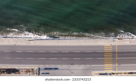 rough waves hitting the highway