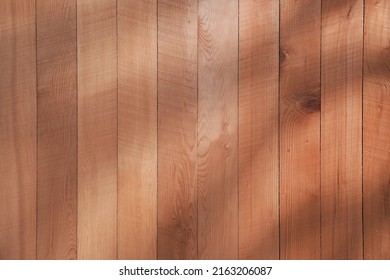 Rough Wood Spliced Desktop Or Wall. With Light And Shadow Like Tree Shadow. Wood Grain Background. Warm Tones