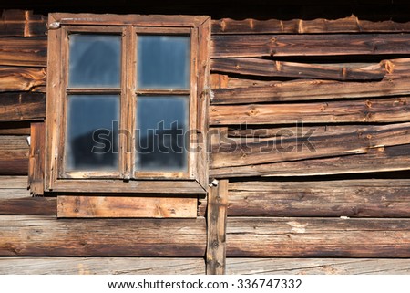 Rough Wood Wall of Summer Shepherds Hut with Window, fabulous timber texture