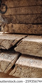 Rough-Cut Timber Planks Stacked in a Lumber Warehouse