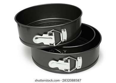 Round baking springforms on white background