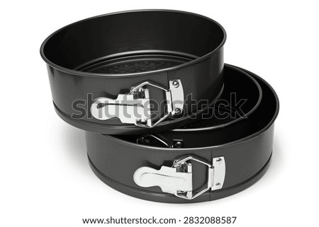 Round baking springforms on white background
