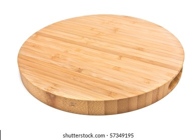 Round Bamboo Chopping Board From Low Perspective Isolated Against White Background.