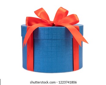 Round Blue Gift Box With Red Bow On A White Background.