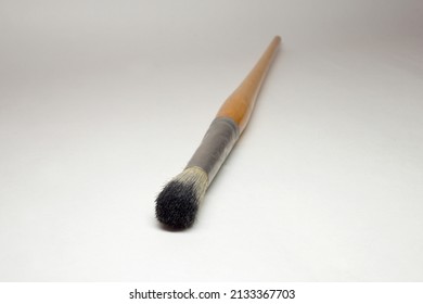 Round Bristle Brush, Black Tip Of White Hog Bristle Closeup, Metal Seamless Ferrule, Yellow Wooden Handle