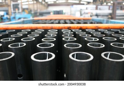 Round Carbon Steel Pipe Background, Selective Focus.