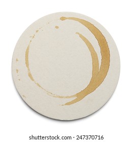 Round Cardboard Coaster With Drink Ring Stains Isolated On White Background.