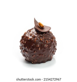 Round Chocolate Mousse Cake Isolated. French Glazed Nut Dessert, Luxury Mousse Confectionery With Liquid Hazelnuts Souffle Filling On White Background