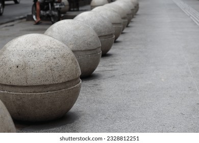 Round concrete seating along the Malioboro Street Tour - Shutterstock ID 2328812251