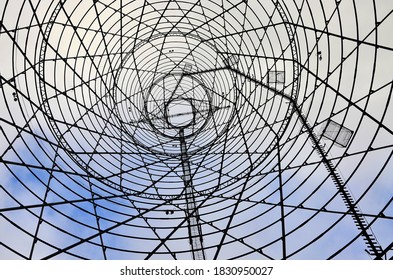 Round construction. Telecommunication, TV, radio antenna tower, high voltage line, metal tower. - Shutterstock ID 1830950027