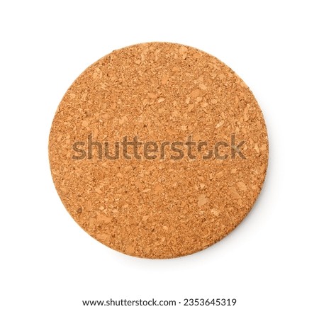 Round cork table coaster on white background