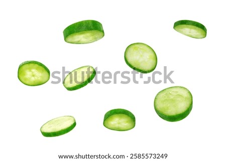 Round cucumber slices from different angles isolated on a white background.