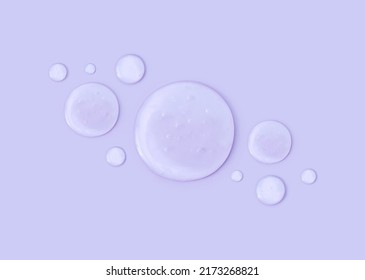 round drops of transparent gel serum on pastel background - Shutterstock ID 2173268821