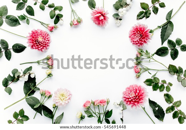 Round frame with pink\
flower buds, branches and leaves isolated on white background. lay\
flat, top view