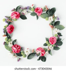 Round Frame Wreath Pattern With Roses, Pink Flower Buds, Branches And Leaves Isolated On White Background. Flat Lay, Top View