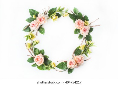 Round Frame Wreath With Pink Roses, Yellow Flowers, Branches, Leaves And Petals Isolated On White Background. Flat Lay, Top View