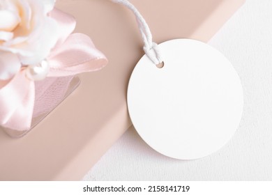 Round Gift Tag Mockup With Beige Wedding Favor On A White Background, Wedding Favor Tag For Souvenir, Sign For Message Greeting, Close Up, Element For Design