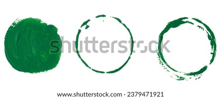 Round green paint imprint on white isolated background