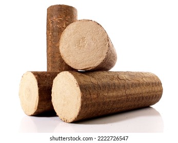 Round Hardwood Sawdust Briquettes - Compressed Biomass Wood Fire Logs Isolated On White Background