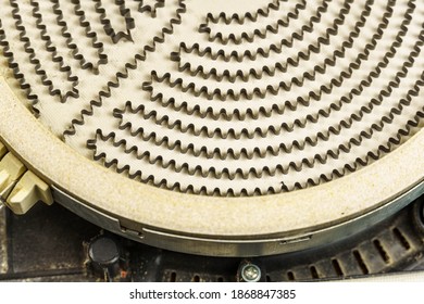 Round Heating Element Of The Electric Stove. Close-up Of A Heating Coil On A Stove