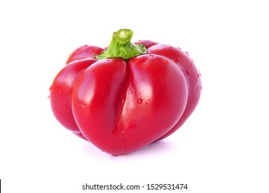 Round of Hungary sweet pepper, specialty pimento cheese is a ribbed, flattened pepper of intense red with very thick, sweet, delicious flesh.Whole paprika pepper over white background.