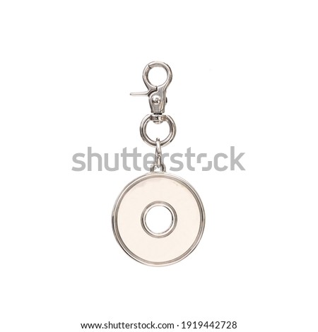 Round keychain with carabiner for bag isolated on white background