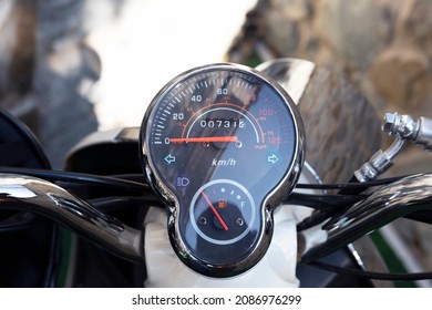 Round macro of speedometer. Red arrow on the speedometer. Odometer. Arrow of fuel level indicators. Lifestyle. Copy space. High quality photo