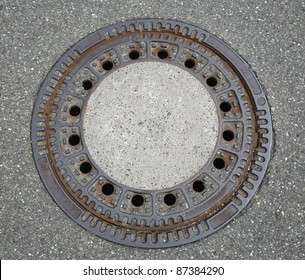 Round Manhole Cover Seen From Above