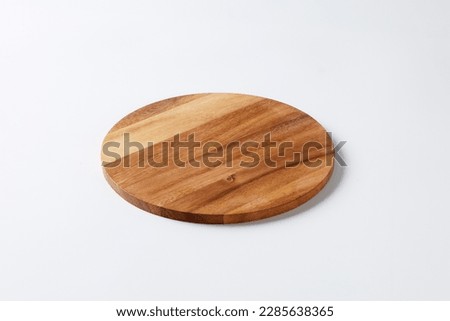 Round mix brown wooden board isolated shot on white background at high angle