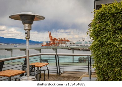 Round Mushroom Propane Patio Heater In Outdoor Restaurant Patio. Gas Heater For Patio-April 11,2022-Vancouver BC, Canada. Street Photo, Travel Photo, Selective Focus, Nobody