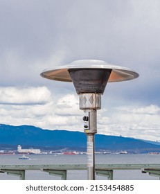 Round Mushroom Propane Patio Heater In Outdoor Restaurant Patio. Gas Heater For Patio-Vancouver BC. Street Photo, Travel Photo, Selective Focus, Nobody