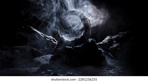 Round mystical portal. Rocks in smoke on a dark background. Panoramic view of the abstract fog. Mockup for your logo.