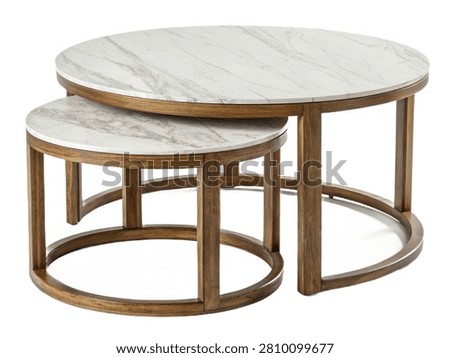A round nesting coffee table set with white marble tops isolated on white transparent background.