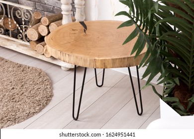 Round Oak Coffee Table Made Of Wood With Stiletto Heels