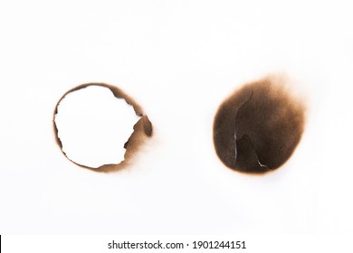 Round Paper Burns On White Background. Burning Paper