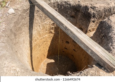 Round Pit For A Septic Tank. Sewerage Construction.