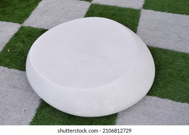 Round Plastic Table At The House Yard