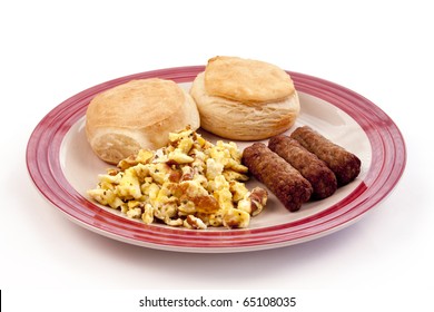 Round Plate Of Breakfast Biscuits, Scrambled Eggs, And Sausage Links