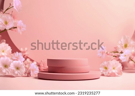 Round podium with branch of sakura in pink color. Mockup to promote eco or organic product , cosmetics.