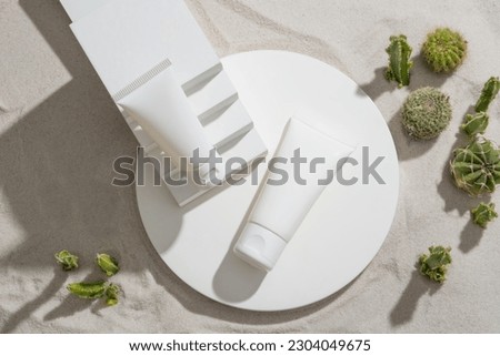 Round podium with a staircase and two empty label tubes placed on. Mockup of skin care cosmetic tube of beauty facial. Skin care concept