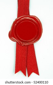 Round Red Wax Seal On A Red Ribbon